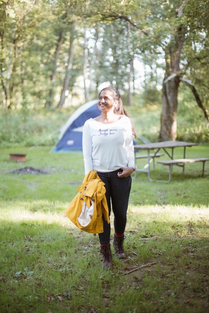 Lifestyle blogger Surekha of Dreaming Loud wearing Barbour waterproof rain jacket - Fall Camping Checklist featured by popular Ohio lifestyle blogger, Dreaming Loud