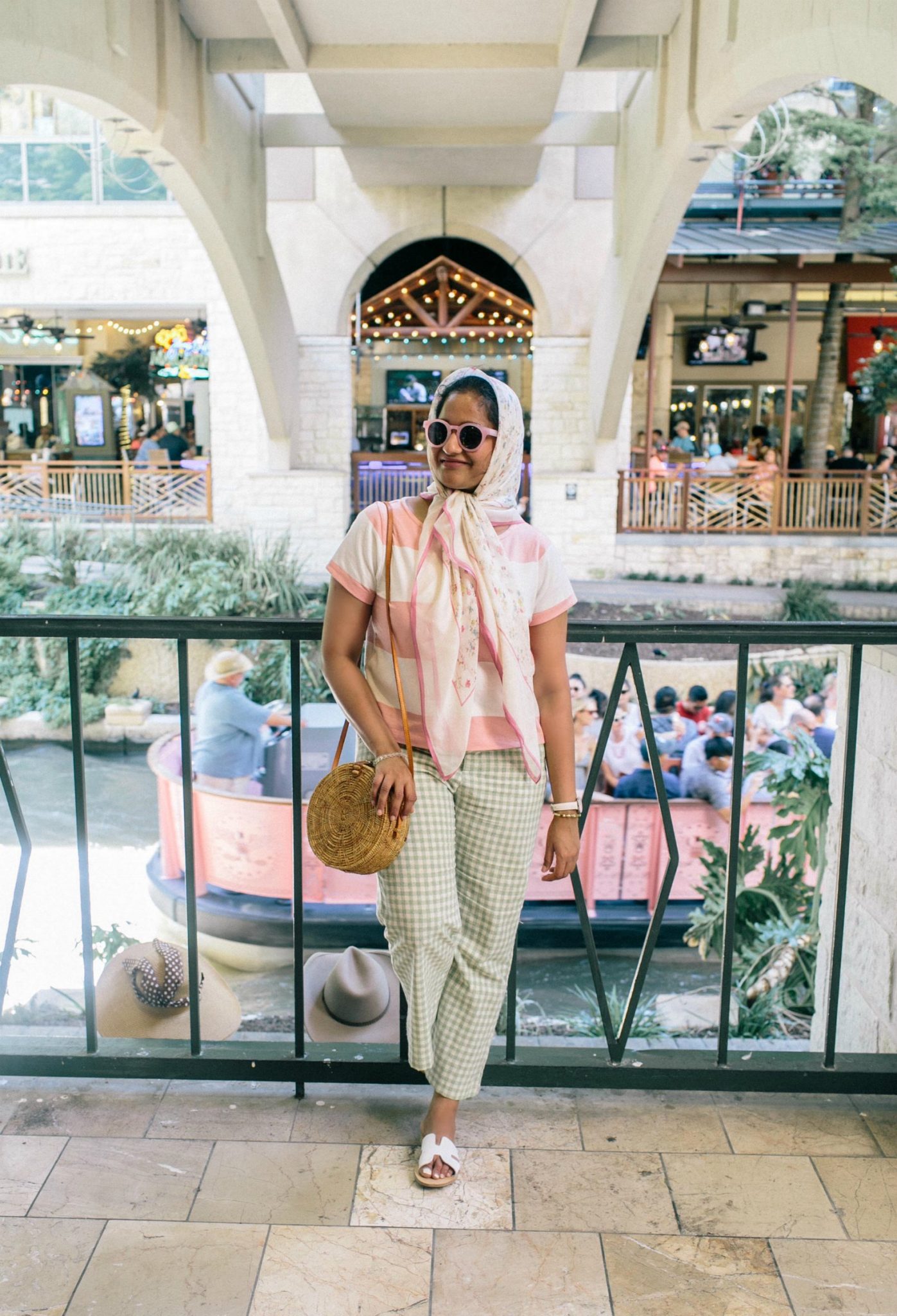 Wearing UO Leanna Gingham Cropped Flare Pant in green with pink madewell Boxy Stripe Tee - A Day in Austin and San Antonio -Attractions, Where to Eat and What to Wear featured by popular US travel blogger, Dreaming Loud