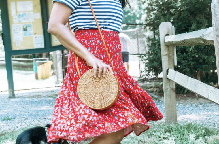 5 Cute Fourth of July Outfits to Celebrate Independence Day in Style featured by top US modest fashion blog, Dreaming Loud: image of a woman wearing St. John's Bay Womens Elastic Waist Midi Pleated Skirt, Everlane striped box tee, Steve Madden Kataryna Sandal