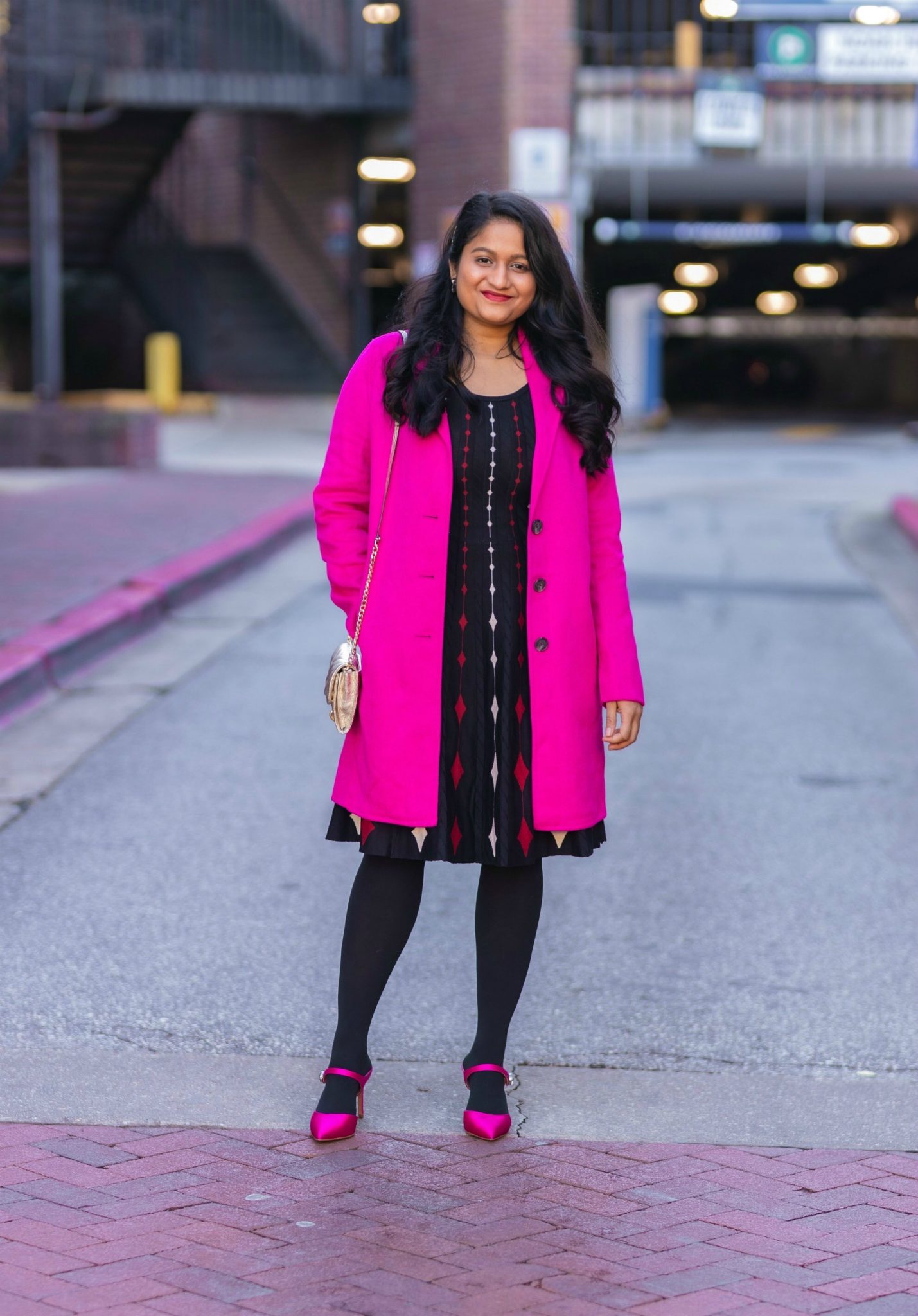 5 Cute Christmas Party Outfits by popular Maryland modest fashion blog, Dreaming Loud: image of a woman wearing Banana Republic topcoat in Hit pink,DANNY AND NICOLE diamond sweater dress,Fuchsia Pink Satin pumps, Rebecca minkoff Edie Chain Wallet.