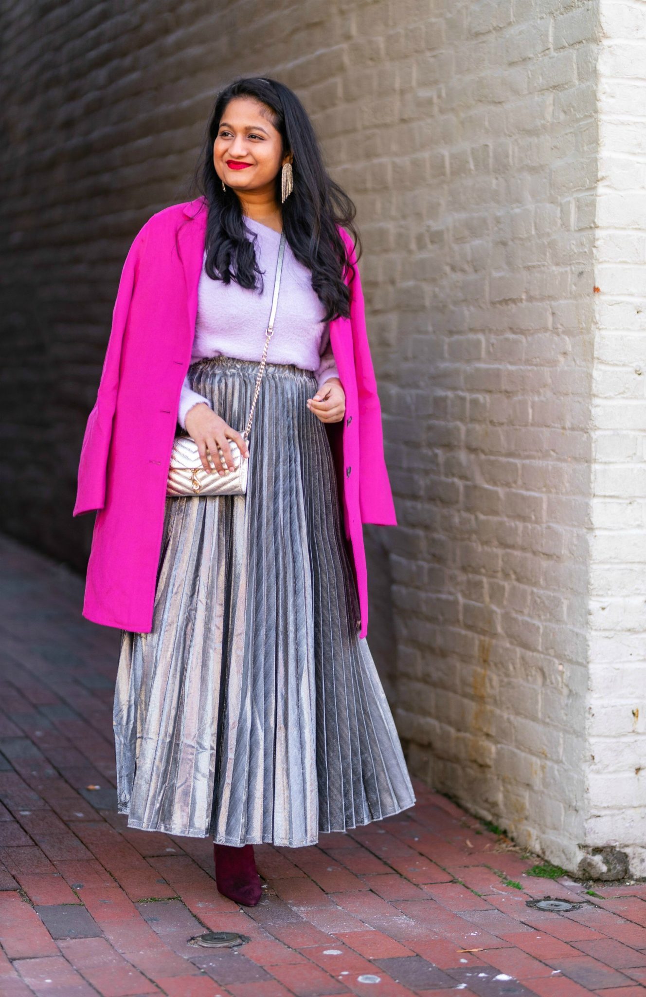 Amazon Holiday Fashion Favorites Under $50, featured by top US modest fashion blog, Dreaming Loud: image of a woman wearing Halogen Fuzzy V-Neck Sweater, amazon Silver pleated midi skirt,Banana Republic Topcoat in hot pink, Boden Burgundy knee high boots