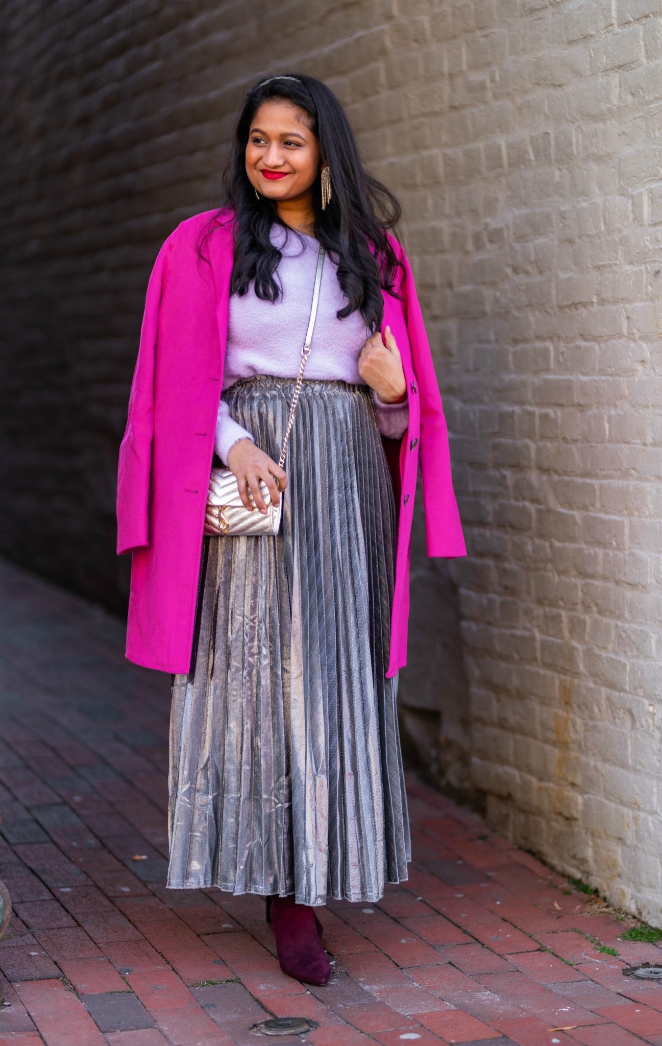 Amazon Holiday Fashion Favorites Under $50, featured by top US modest fashion blog, Dreaming Loud: image of a woman wearing Halogen Fuzzy V-Neck Sweater, amazon Silver pleated midi skirt,Banana Republic Topcoat in hot pink, Boden Burgundy knee high boots