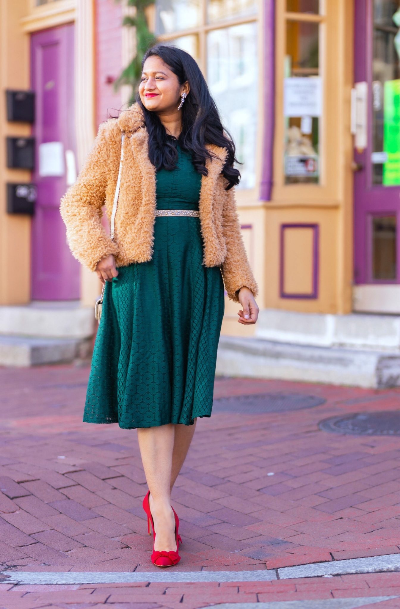 5 Cute Christmas Party Outfits by popular modest fashion blog, Dreaming Loud: image of a woman wearing Danny & Nicole green Lace Floral Fit & Flare Dress_ blanknyc faux fur teddy coat_Rhinestone Belt.