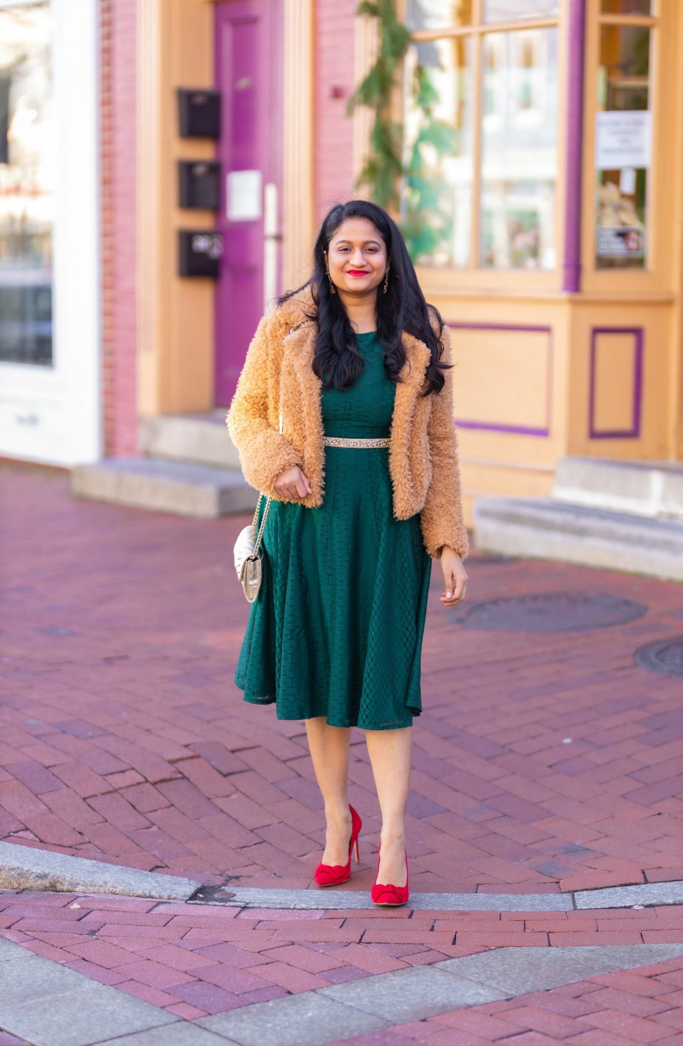 5 Cute Christmas Party Outfits by popular modest fashion blog, Dreaming Loud: image of a woman wearing Danny & Nicole green Lace Floral Fit & Flare Dress_ blanknyc faux fur teddy coat_Rhinestone Belt.