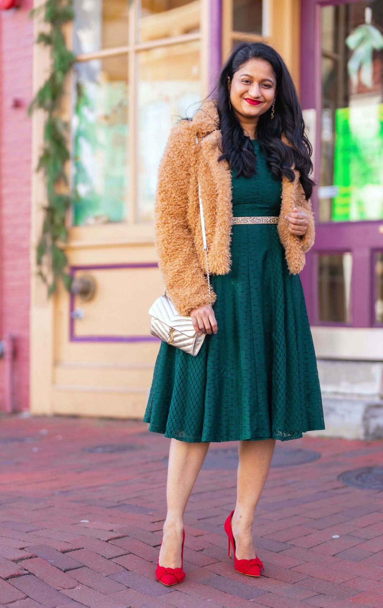 5 Cute Christmas Party Outfits by popular modest fashion blog, Dreaming Loud: image of a woman wearing Danny & Nicole green Lace Floral Fit & Flare Dress_ blanknyc faux fur teddy coat_Rhinestone Belt.