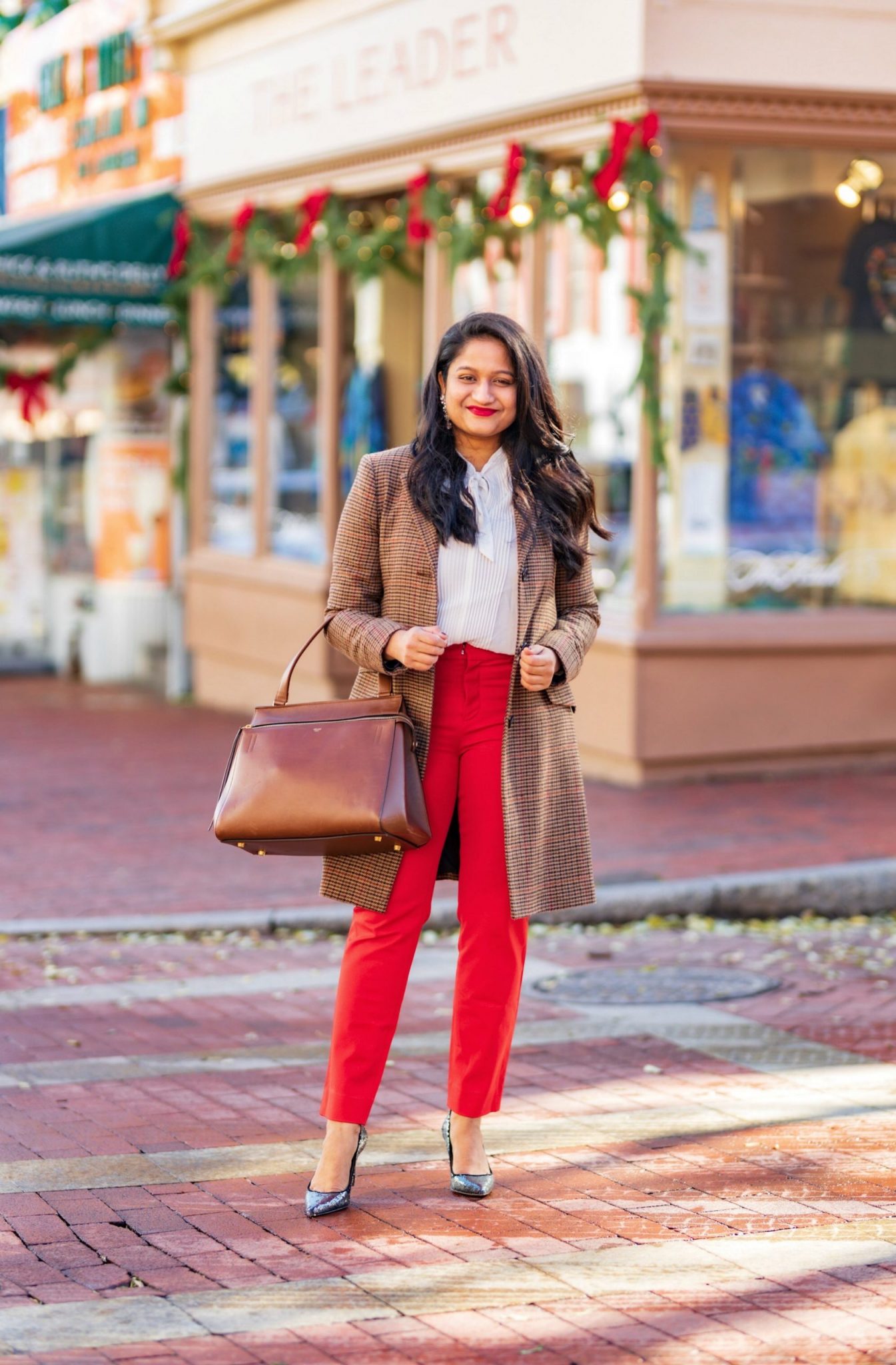 5 Cute Christmas Party Outfits by popular Maryland modest fashion blog, Dreaming Loud: image of a woman wearing wearing Lauren Ralph Lauren Single Breasted Reefer Coat, Banana republic red sloan trousers.