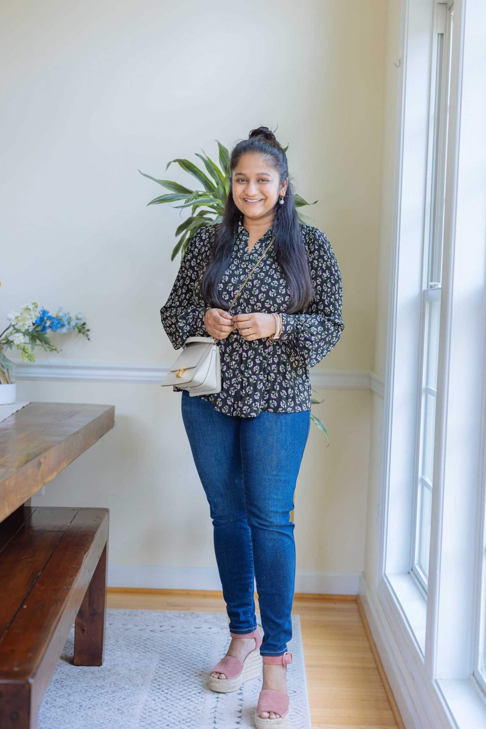 Wearing Tahari Floral-Print Pleated Blouse,Spanx Ankle Skinny Jeans, Midnight Shade, Marc Fisher pink wedges, Victoria Emerson Alejandra bracelet, Polene Numero Sept Mini in chalk