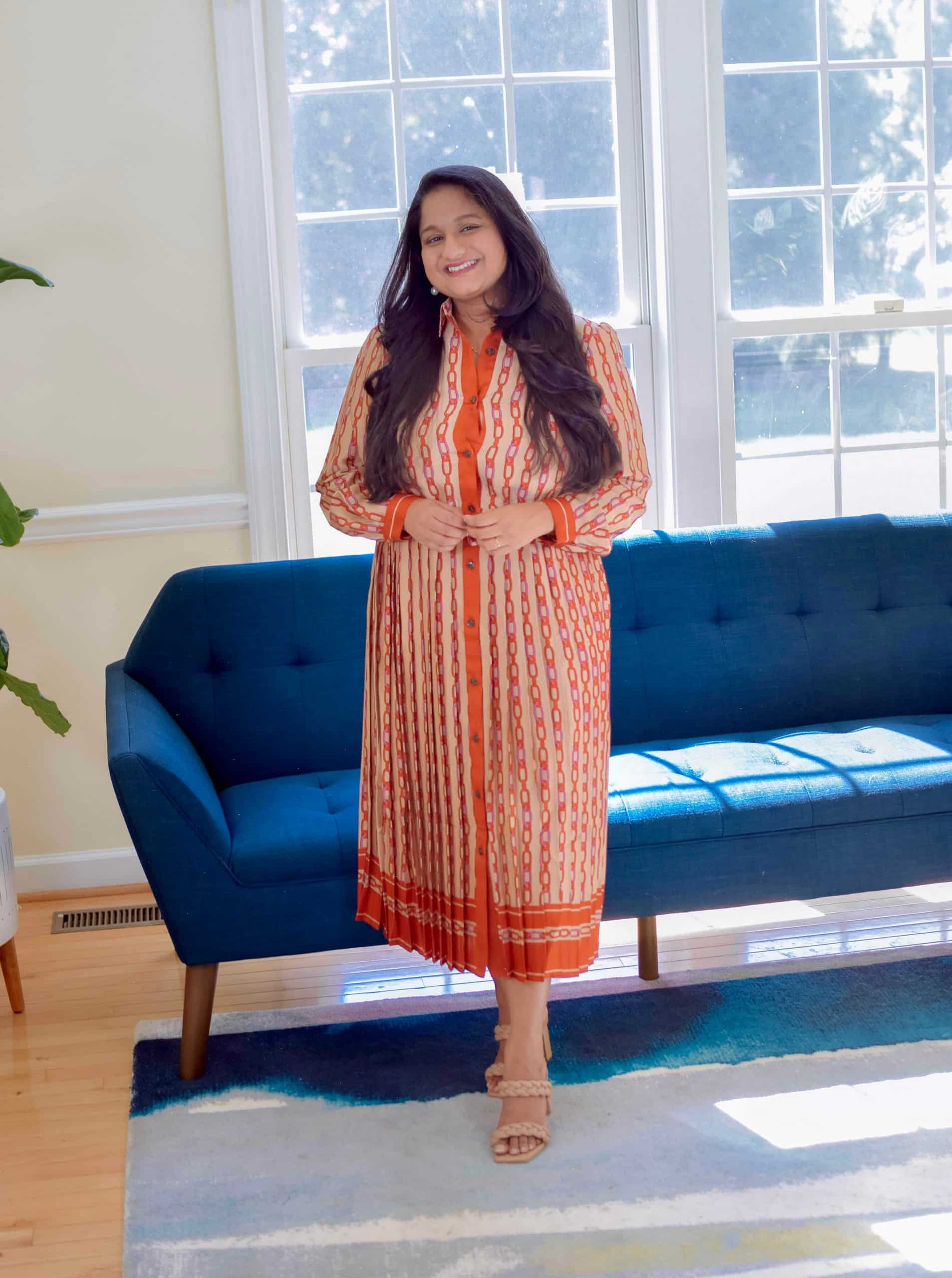 Wearing Ann Taylor Chain Print Pleated Dress, Dolce Vita Paily Braided Double Strap High Heel Sandals-Navratri Day 2 Red Outfit By Modest Fashion Blogger Dreaming Loud