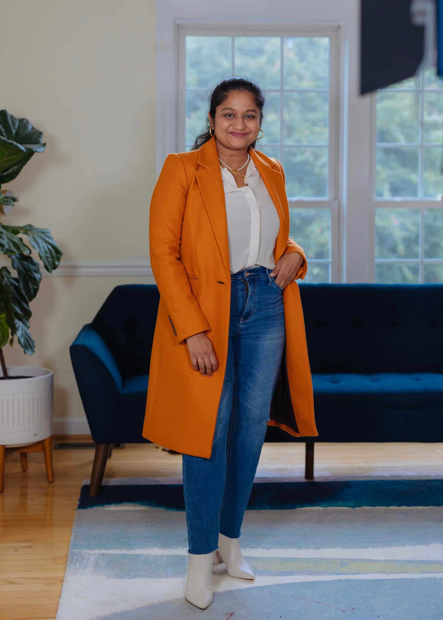 Orange Coat Fall Outfit- wearing Mango Orange coat, .KUT Straight leg jeans,Everlane The Clean Silk Relaxed Shirt, marc fisher Ulani booties by top Modest fashion blogger dreaming loud