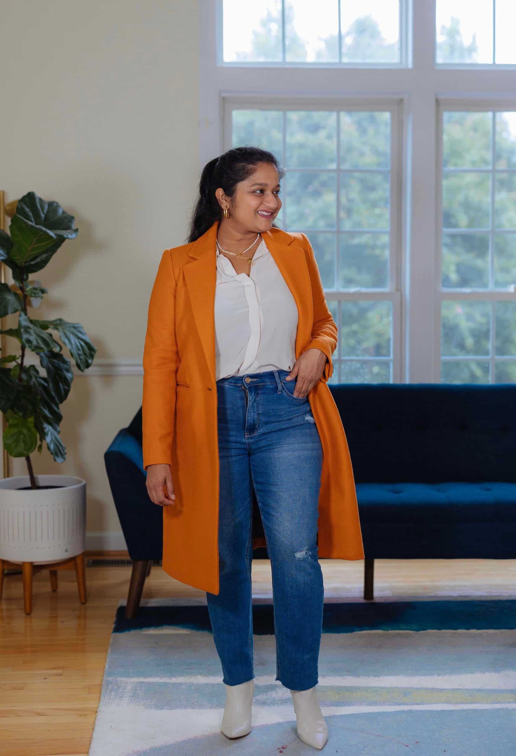 Orange Coat Fall Outfit- wearing Mango Orange coat, .KUT Straight leg jeans,Everlane The Clean Silk Relaxed Shirt, marc fisher Ulani booties by top Modest fashion blogger dreaming loud