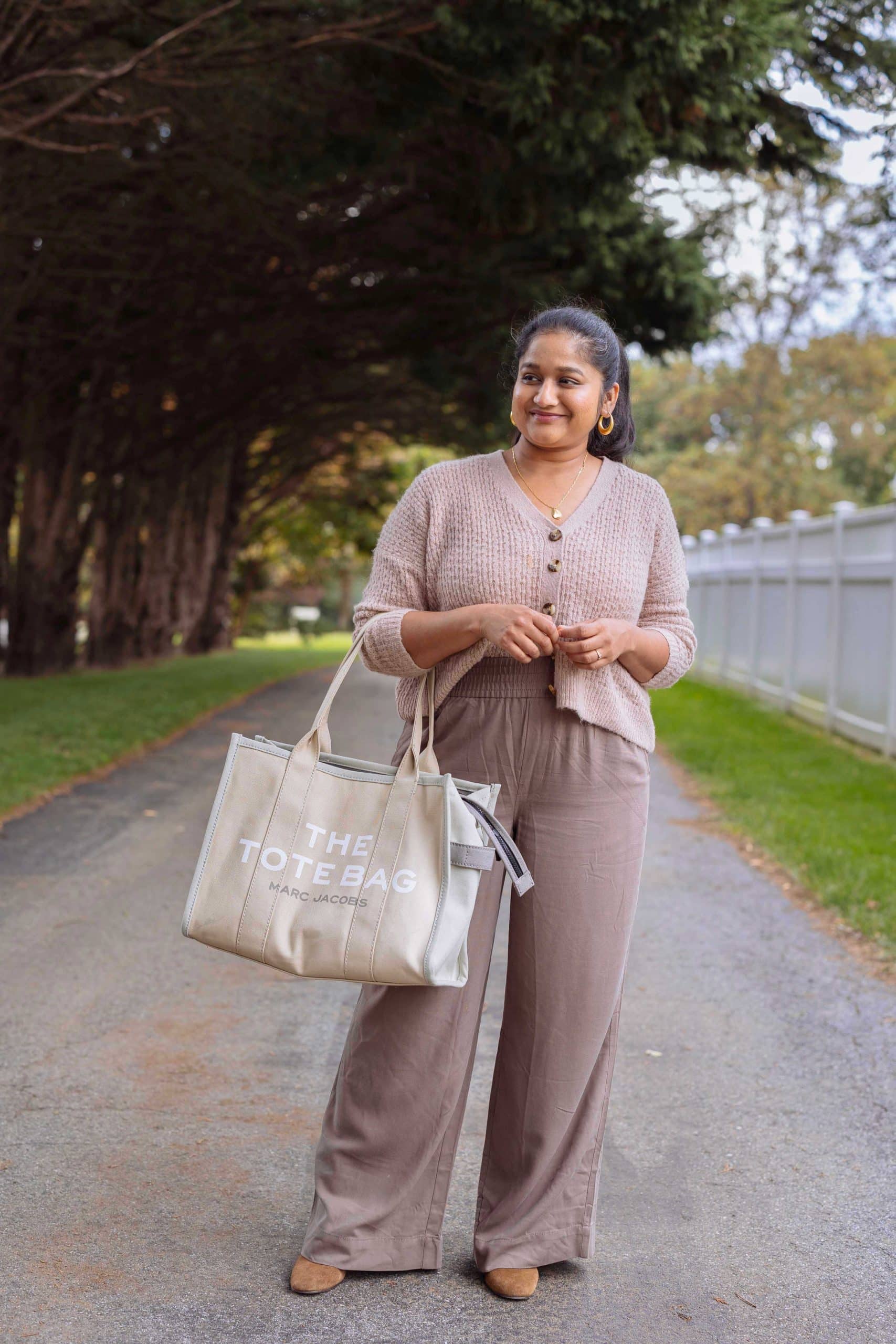 Wearing Fall 2022 Trend-wide leg pantss- Madewell Drapeweave Carley Wide-Leg Pants, Mayfair Sweater Cardigan,J.crew Stevie ankle boots in suede, Marc Jacobs Traveler Canvas Tote