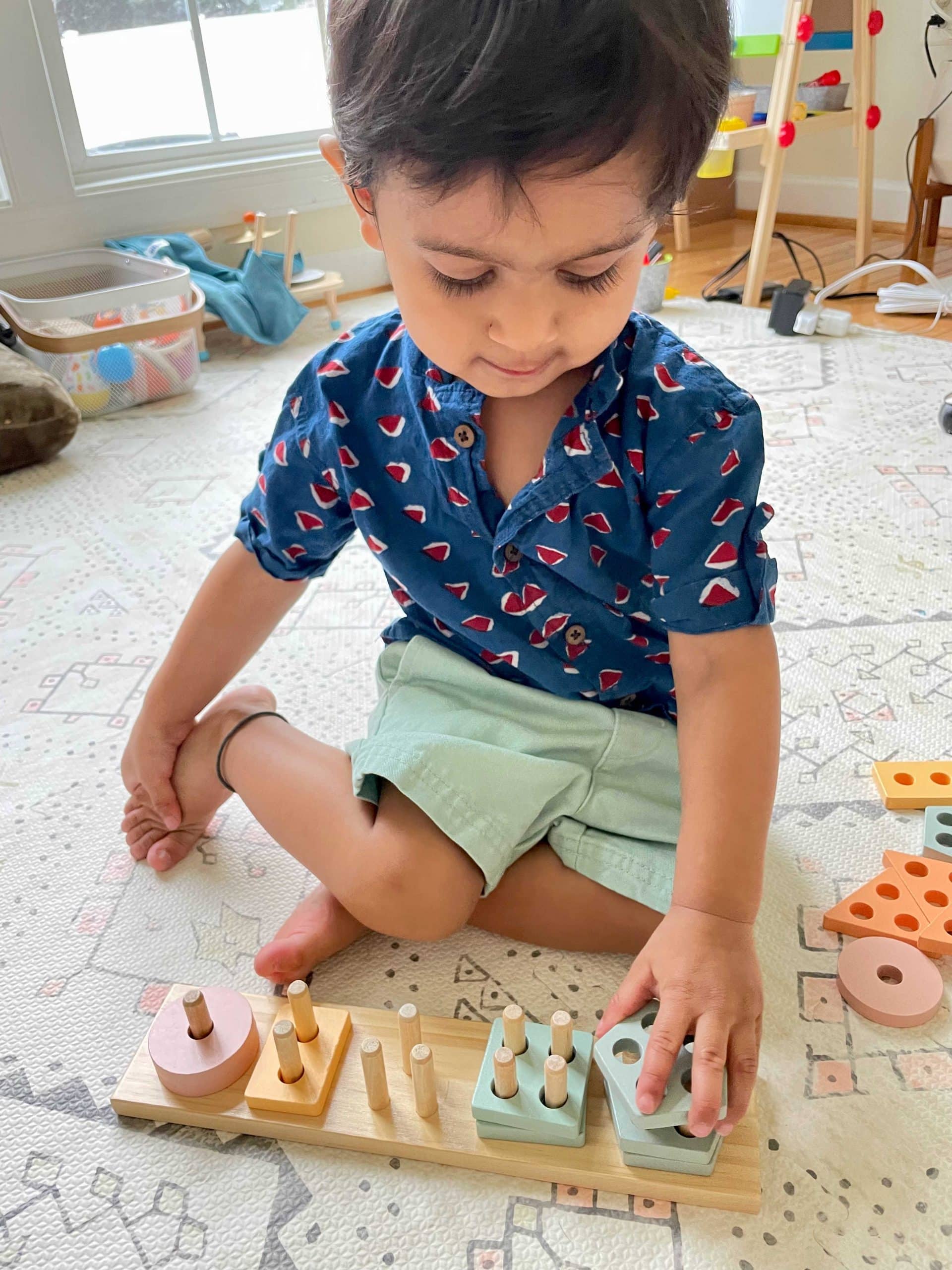 Shape sorting and stacking puzzles for 2 year old by top US mom blogger dreaming loud