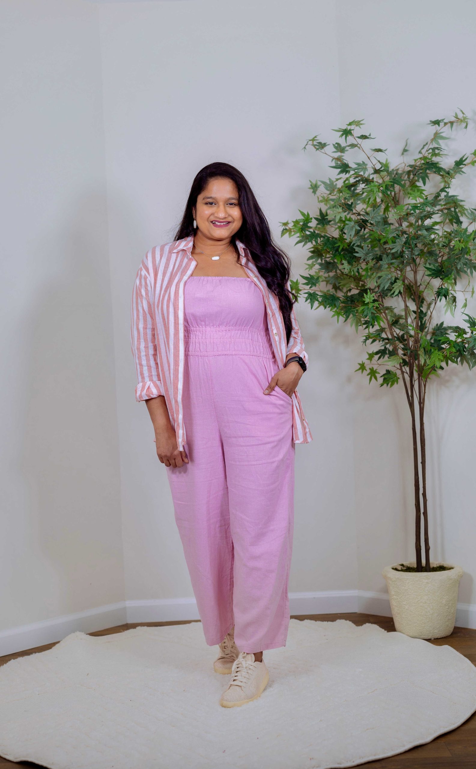 10 Spring Mid-Size Outfit Ideas- Wearing Old Navy Pink Linen Jumpsuit, Kendra Scott Elisa Pendant Necklace , Old Navy Striped Linen Shirt, Espadrille Sneakers by Top US Mid Size Blogger Dreaming Loud