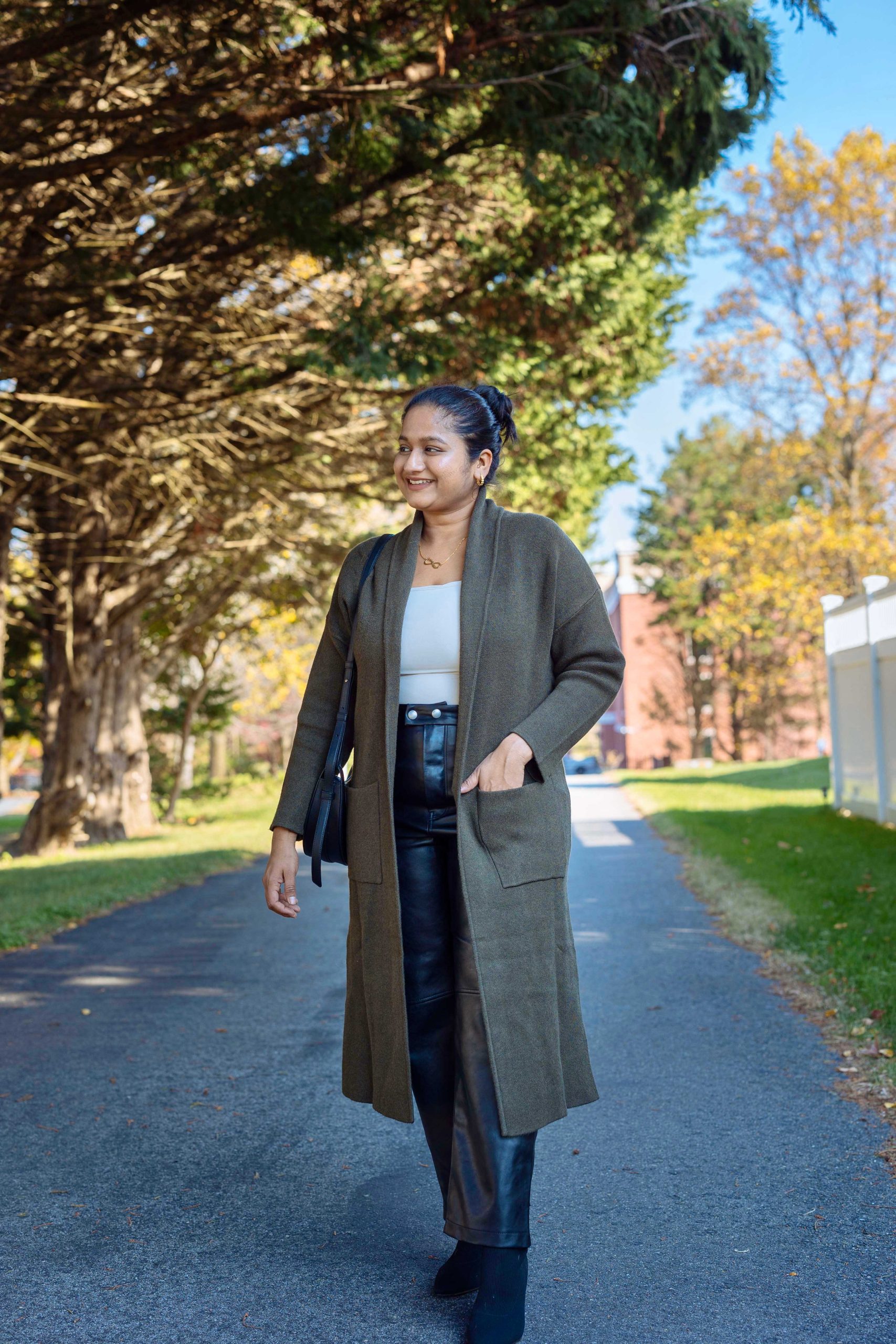 5 Cute Thanksgiving Outfit Ideas for Mid-Size Beauties - Wearing BlankNyC Faux Leather The Baxter Pants, Mango Oversized knitted coat, Polene Numero Dix by Top US Mid-size fashion blogger dreaming loud