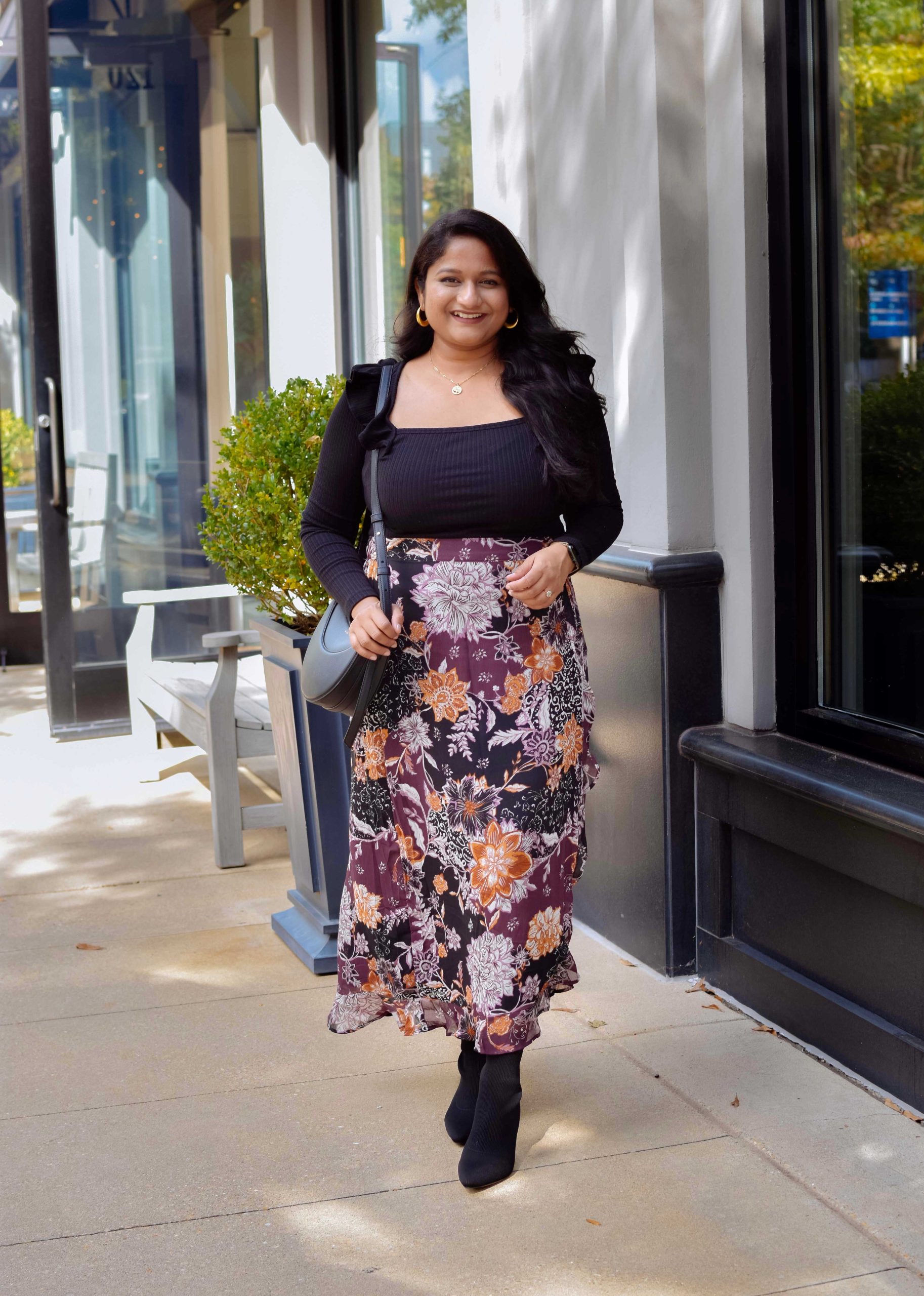 5 Cute Thanksgiving Outfit Ideas for Mid-Size Beauties - Wearing Maurices Briar Faux Wrap Skirt, Loft Pointelle Ruffle Square Neck Top, Veronica Bread Leeland Pointed Toe Chelsea Boot by top US mid-size fashion blog Dreaming Loud. Click to shop 