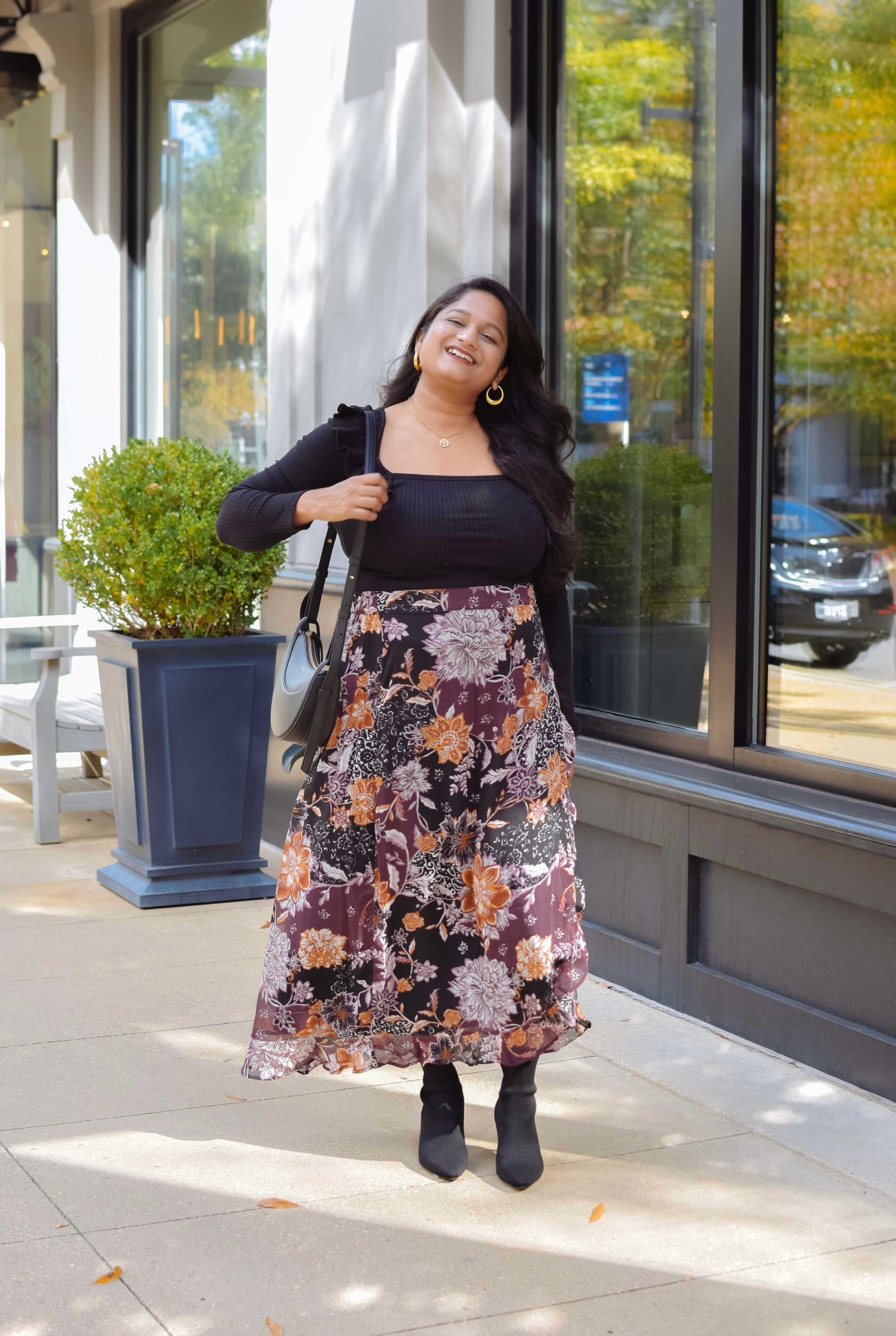 5 Cute Thanksgiving Outfit Ideas for Mid-Size Beauties - Wearing Maurices Briar Faux Wrap Skirt, Loft Pointelle Ruffle Square Neck Top, Veronica Bread Leeland Pointed Toe Chelsea Boot by top US mid-size fashion blog Dreaming Loud. Click to shop 