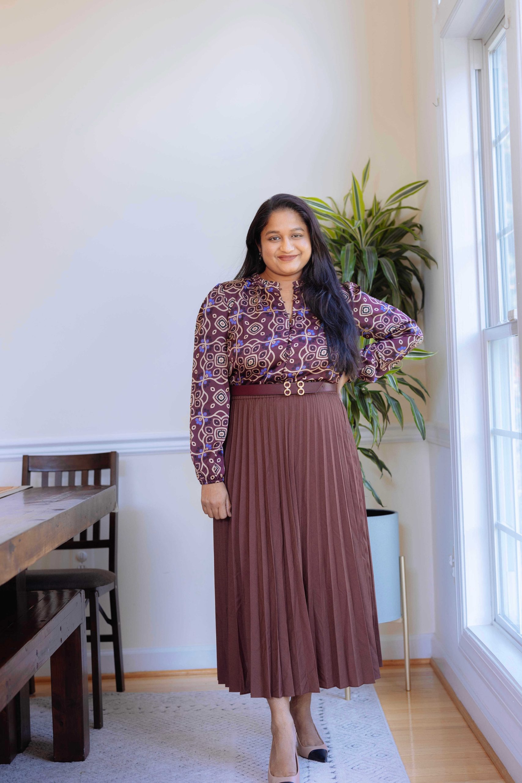 5 Cute Thanksgiving Outfit Ideas for Mid-Size Beauties - Wearing burgundy pleated skirt, Steve Madden Kling Tan leather heels, Ann Taylor Ruffle Neck Top by Top US Mid-size Fashion Blogger Dreaming Loud Click to Shop