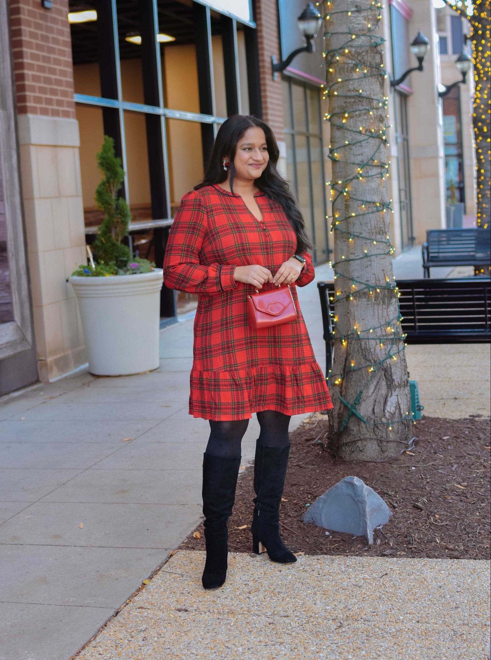 5 Work Christmas Party Outfit Ideas - Wearing Loft Shimmer Plaid Flounce Swing Dress, Sheetax polka dot tights, Sam Edelman Faren Knee High Boot by Top US mom Fashion Blogger Dreaming Loud