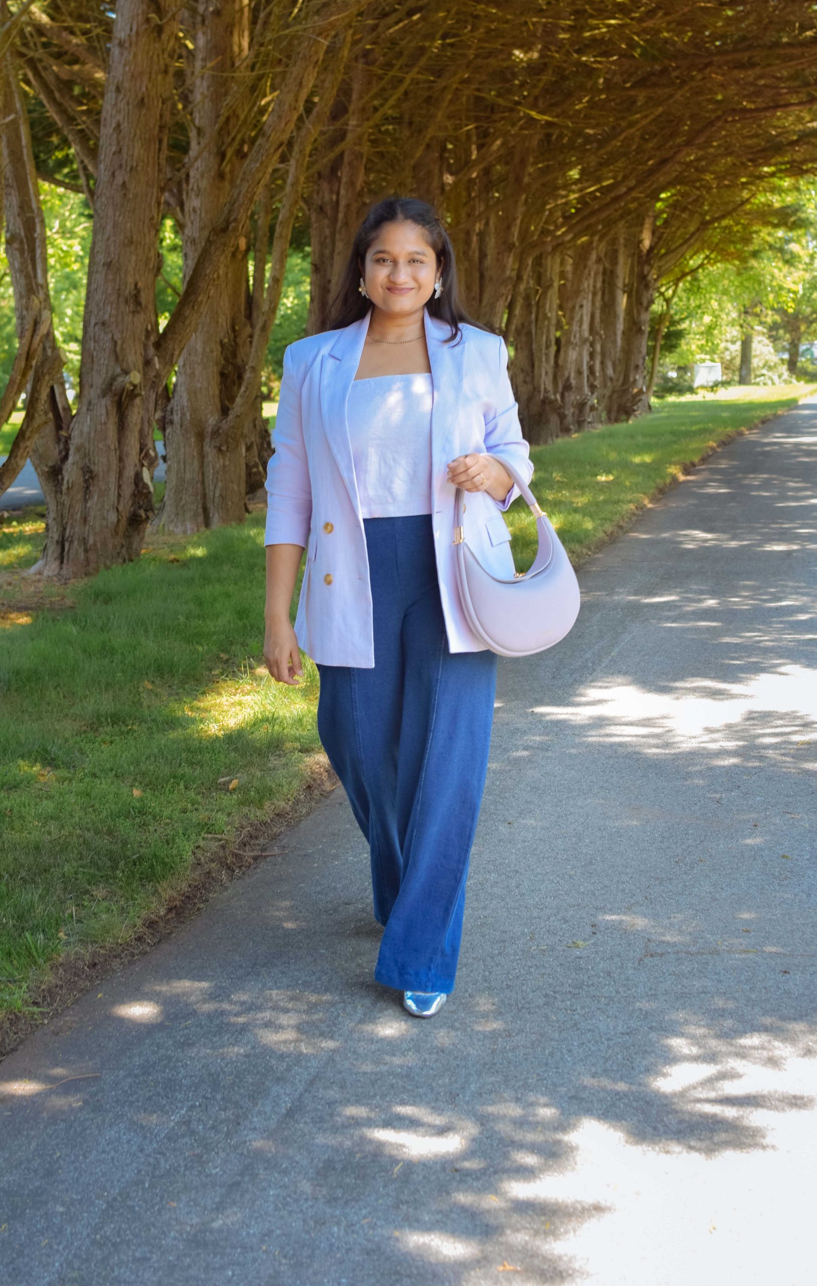 2024 Biggest Spring Fashion Trend-Lavender Blazer and metallic shoes- Wearing Old Navy Lavende Linen Blazer, Lilac Linen crop top, Gap utility easy jeans, Songmont Small Luna Bag by Top US Modest Fashion Blogger Dreaming Loud