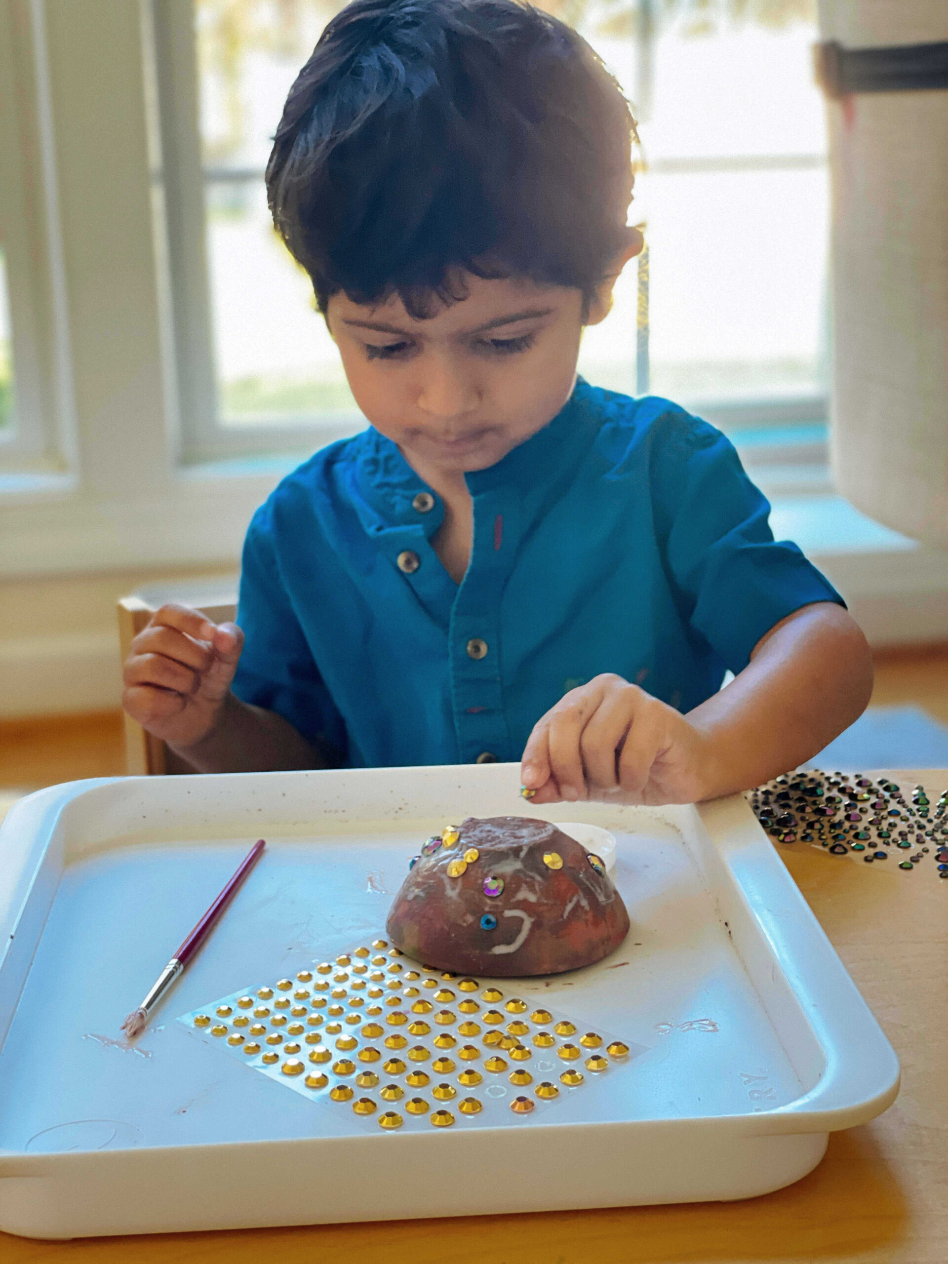 Easy Diwali Activities for Kids- Clay Diya Painting and Emblishelling by Top US Mom Blogger Dreaming Loud