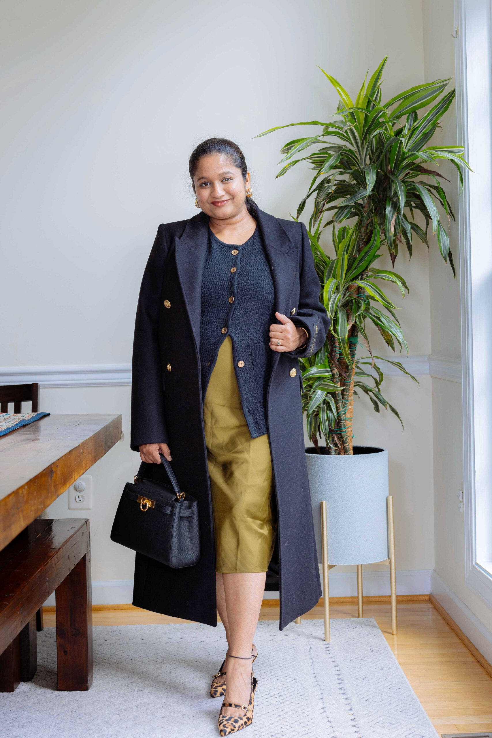 Fall Maternity Outfit Ideas- One quince slik skirt, Amazon Fashion Knit Vest, Aritizia THE CONSTANT COAT, J.crew Leopard print heels by Top Us Mom Fashion Blogger Dreaming Loud