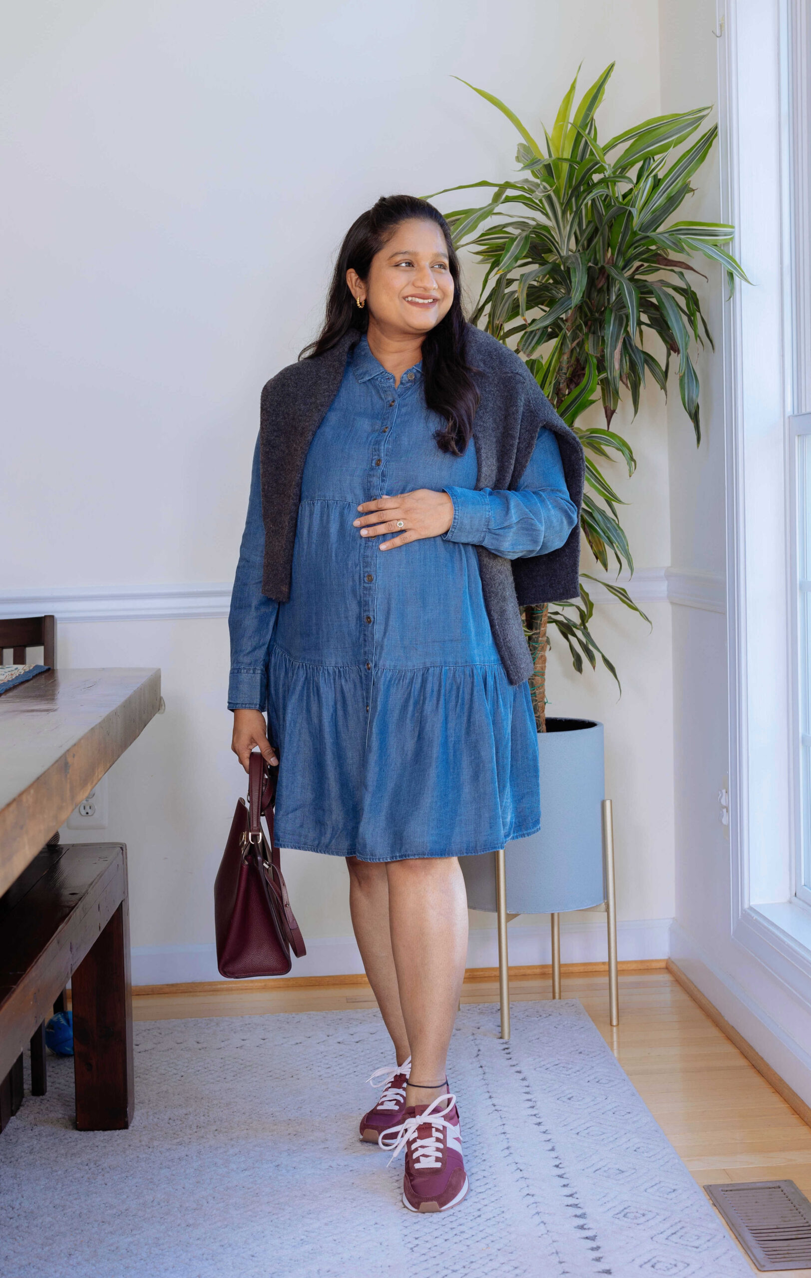 Fall Pregnancy Outfit Ideas- Wearing Ingrid & Isabel Chambray Maternity dress, Kizik Milan Hands-Free Sneakers by Top US mom blogger Dreaming Loud