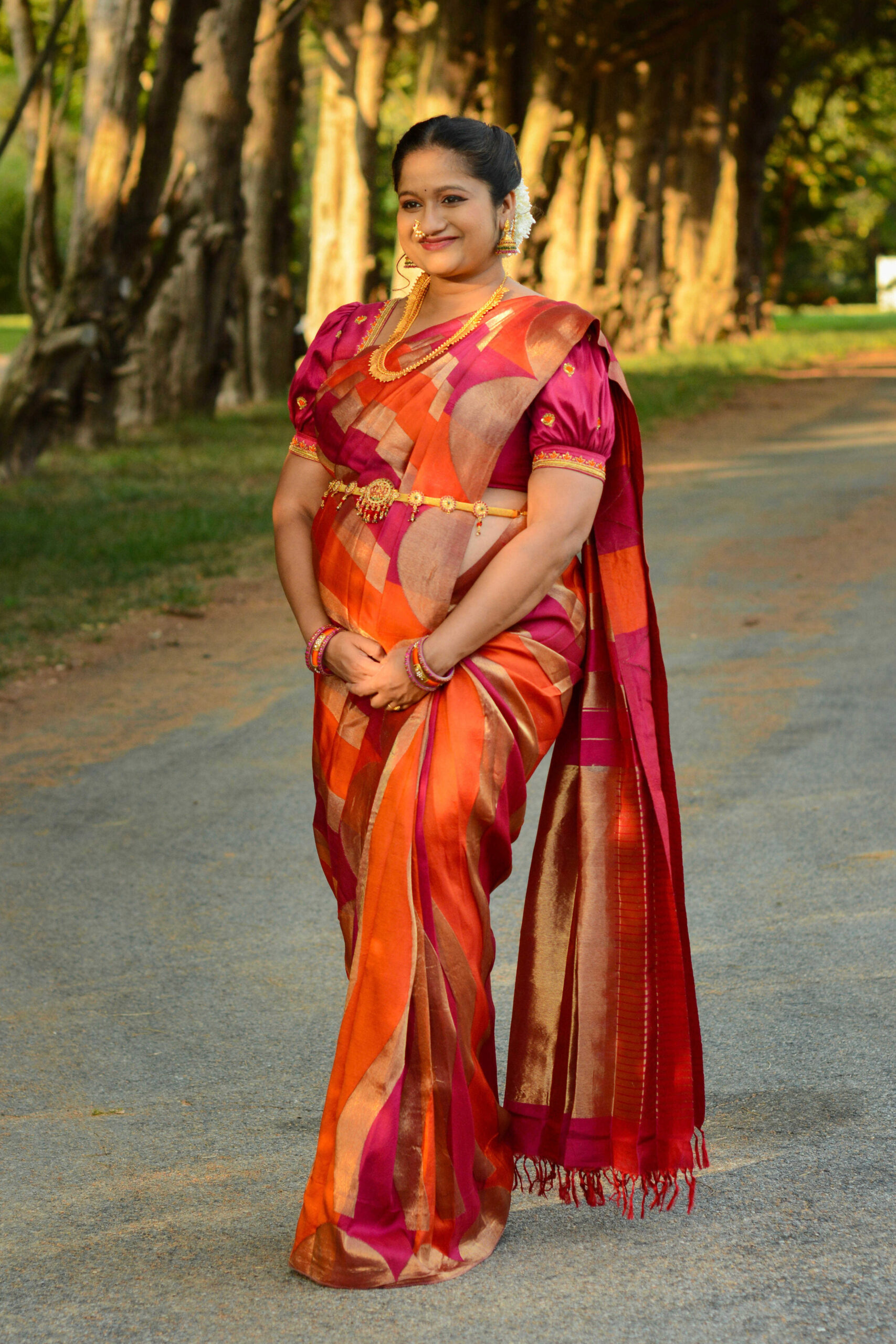 Maternity Photoshoot In Traditional Silk Saree- Orange and Pink Kanchipuram silk saree by Top US Indian Blogger Dreaming Loud