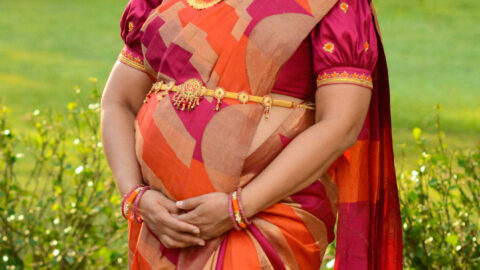 Saree Pregnancy Photoshoot tips- Orange and Pink Kanchipuram silk saree by Top US Saree Blogger Dreaming Loud