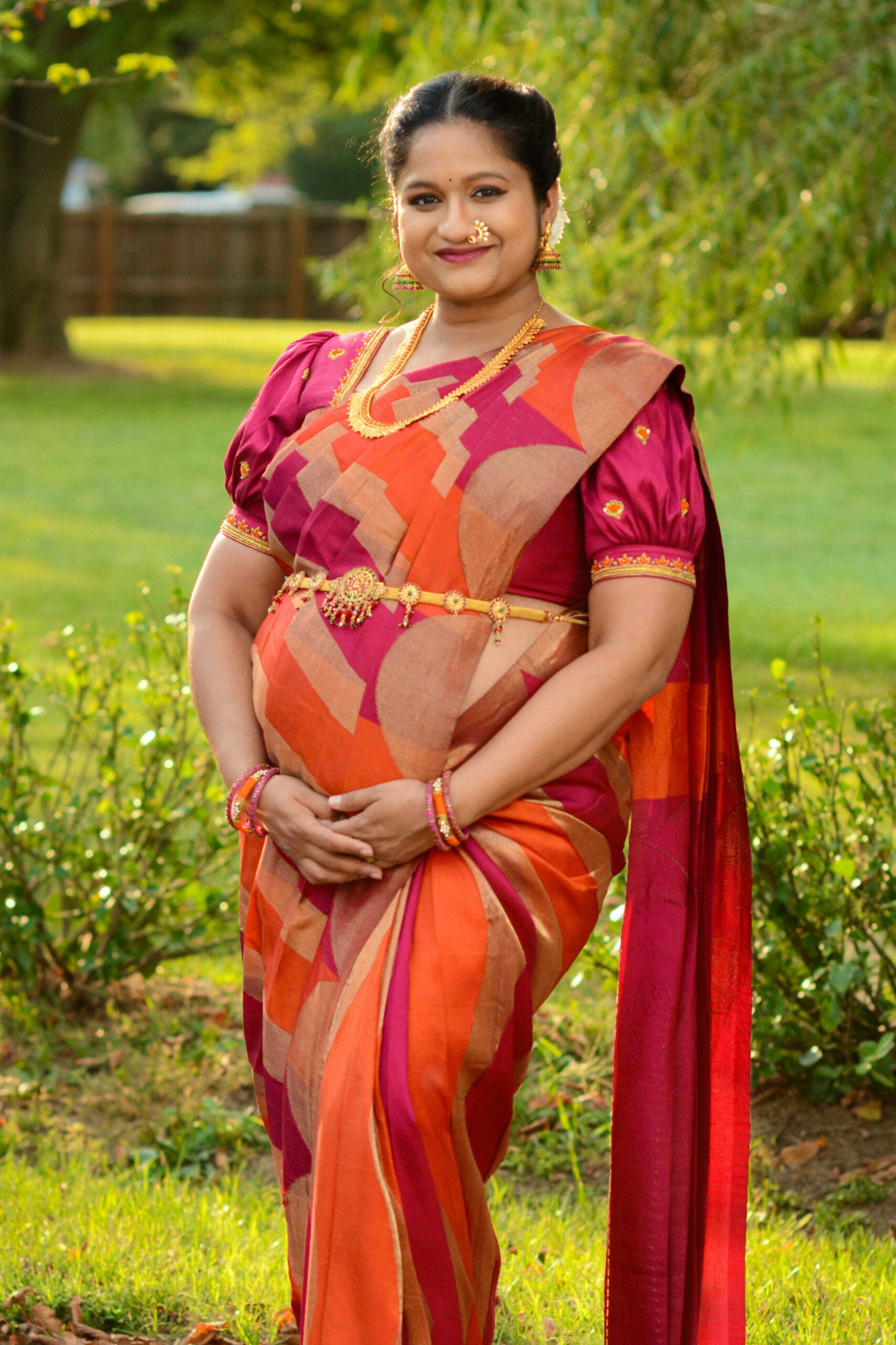 Pregnancy Photoshoot In Traditional Silk Saree- Orange and Pink Kanchipuram silk saree by Top US Saree Blogger Dreaming Loud