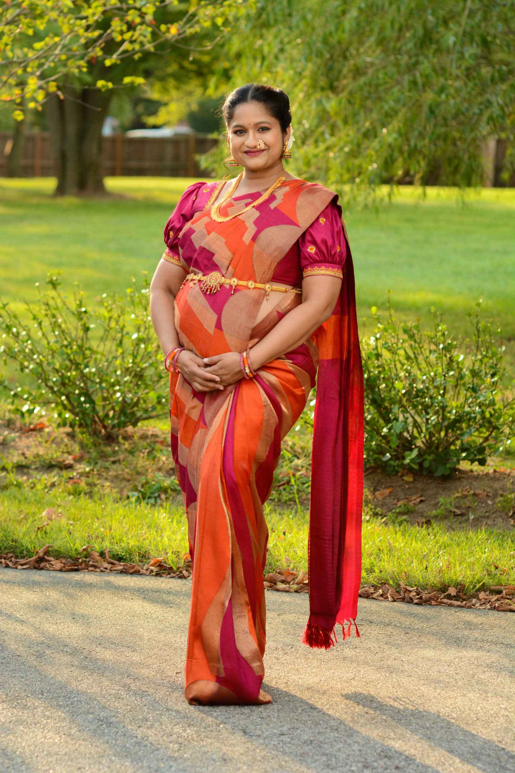 Pregnancy Photoshoot In Traditional Silk Saree- Orange and Pink Kanchipuram silk saree by Top US Saree Blogger Dreaming Loud