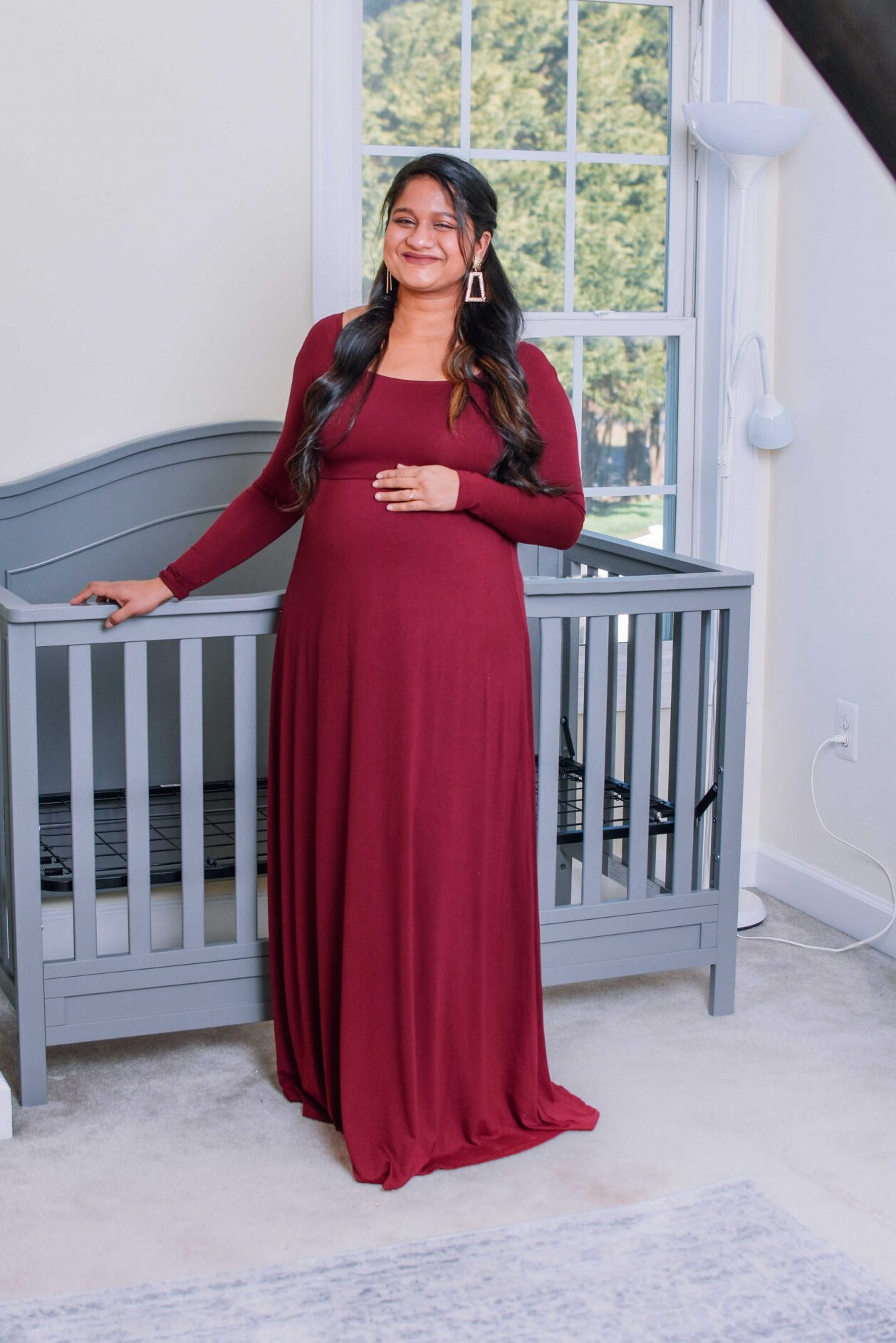 Your Ultimate Guide to Stunning Maternity Shoot Dresses 1- Wearing Pinkblush Off Shoulder Maternity Maxi Dress by Top US Mom Blogger Dreaming Loud