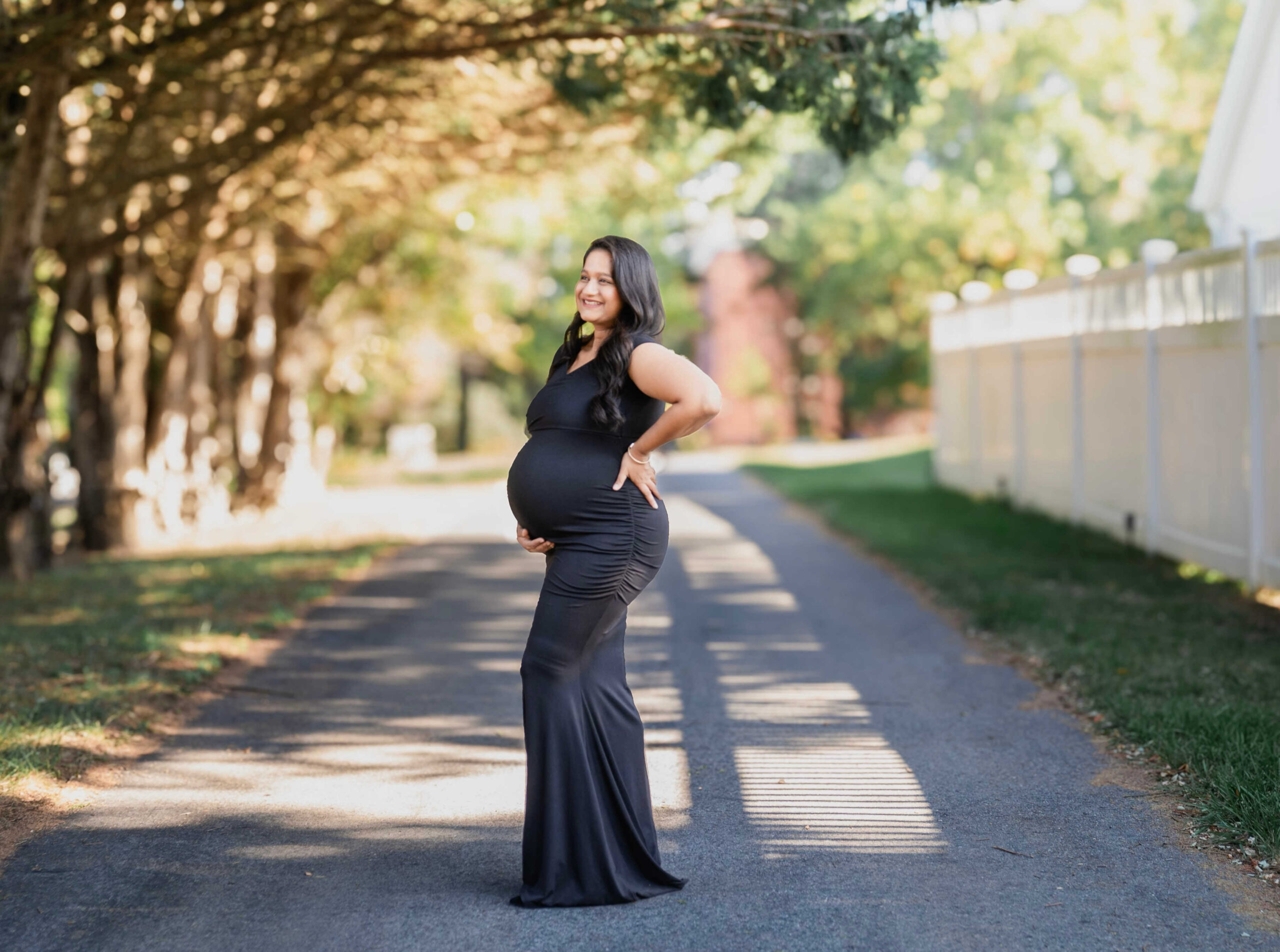 Your Ultimate Guide to What to Wear to A Maternity Shoot - Wearing Pinkblush Maternity Black Off Shoulder Wrap Maternity Photoshoot Dress by Top US Mom Blogger Dreaming Loud