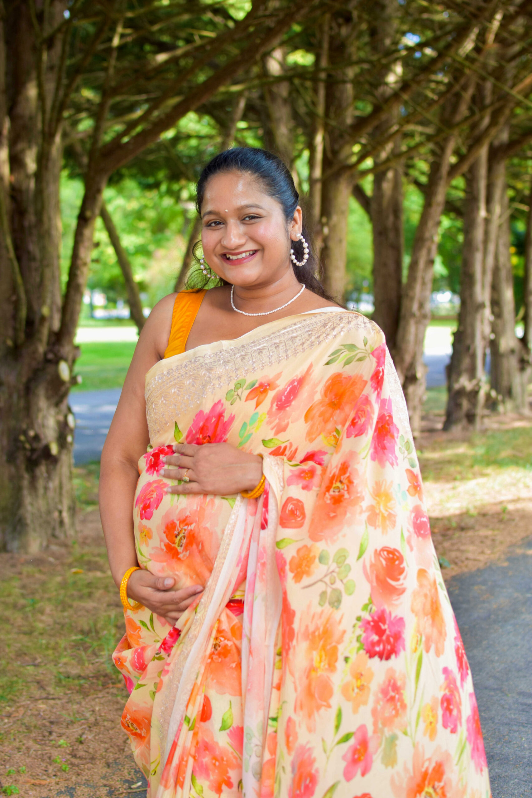 How to Style Saree During Pregnancy_ Top Saree Weaves and Fabrics to Embrace During Pregnancy- how to wear floral chiffon saree with sleeveless blouse by Top Indian Blogger Dreaming Loud