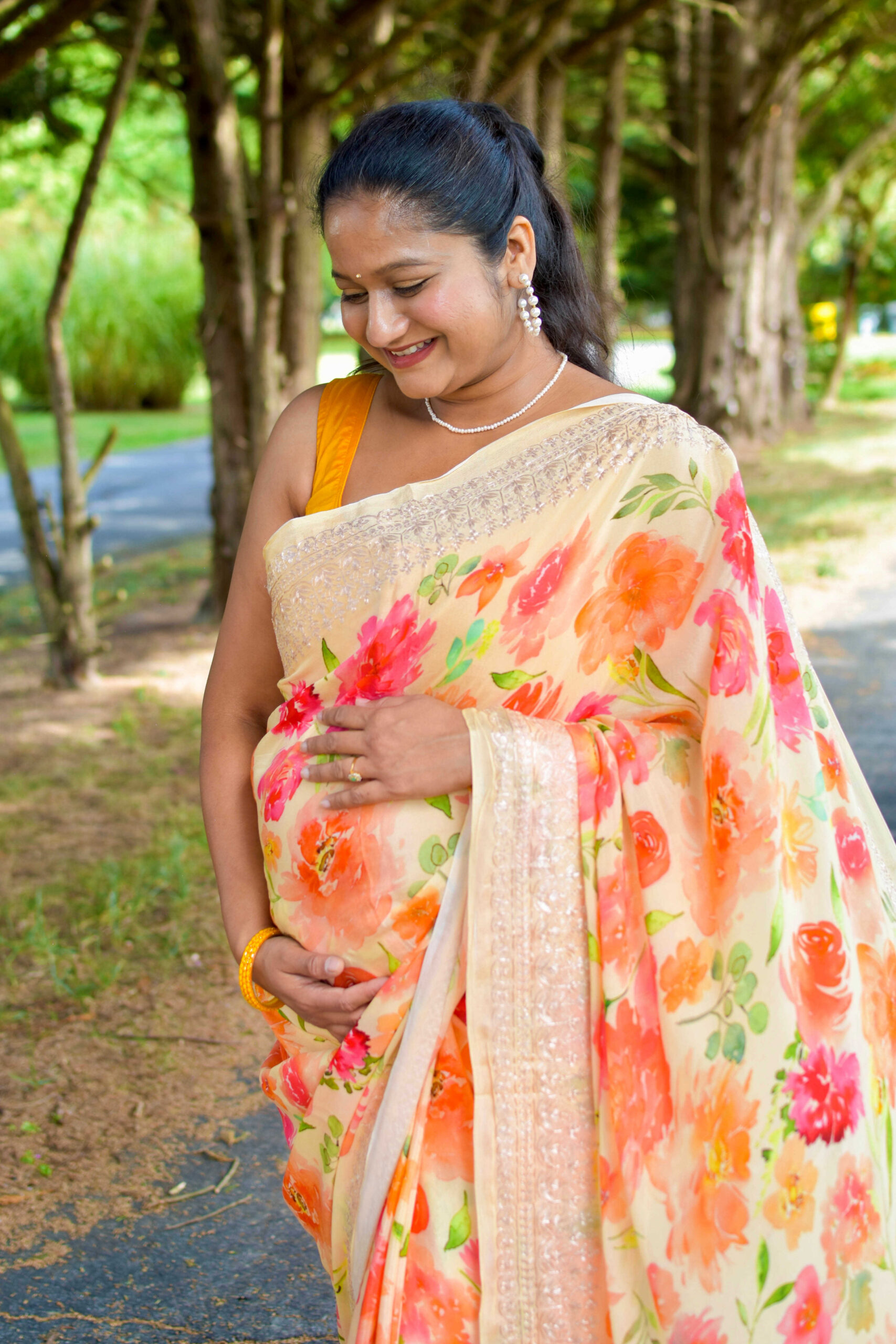 How to Style Saree During Pregnancy_ Top Saree Weaves and Fabrics to Embrace During Pregnancy- how to wear floral chiffon saree with sleeveless blouse by Top US Mom Fashion Blogger Dreaming Loud